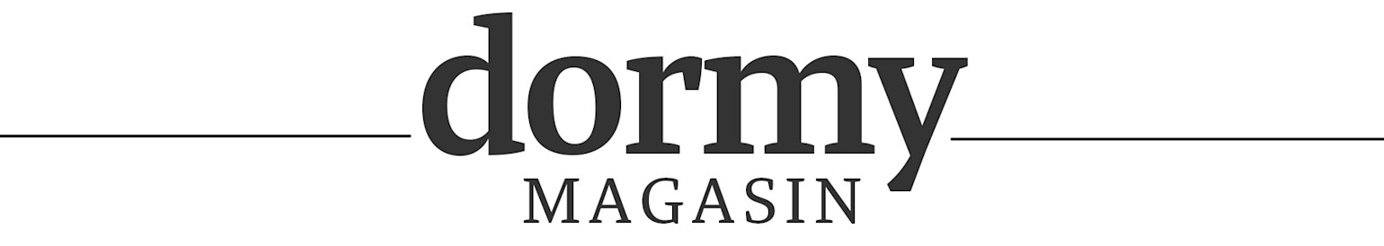 Logo: dormy MAGAZIN i svart text med horisontella linjer på vardera sida mot vit bakgrund.