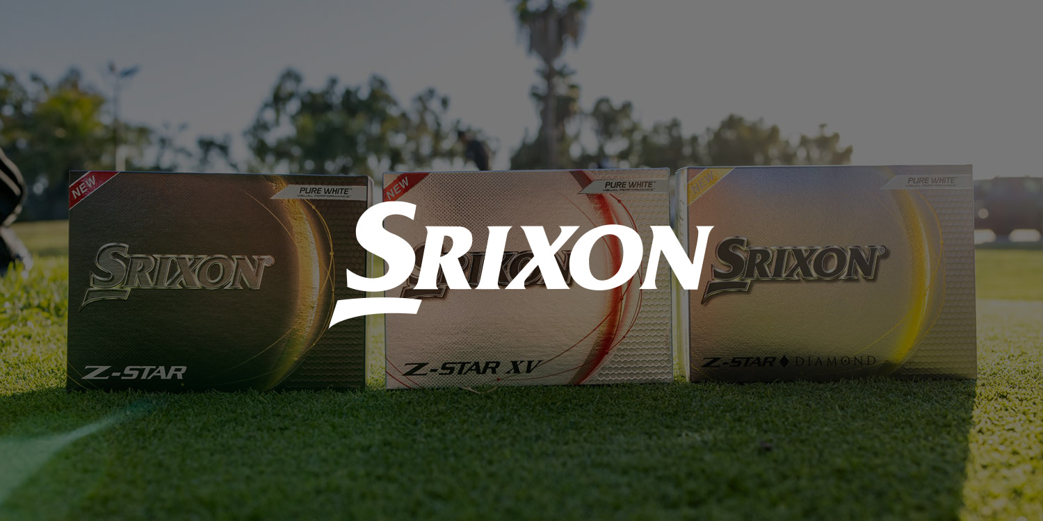 Tre Srixon golfbollsförpackningar, modellerna Z-Star, Z-Star XV och Z-Star Diamond, står på gräs med träd i bakgrunden.